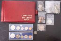 A group of USA coins, including 1922 dollar, 1966/1967 special unit sets, quarter and half dollars,