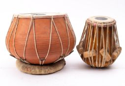 A Bangladeshi terracotta talking drum and one other smaller drum (2)