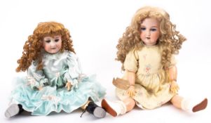 Two Armand Marseille bisque head dolls, both with applied wigs, sleeping eyes ,