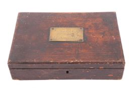 A 19th century pine gun box with fitted interior for two pistols,