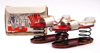 A Pacemaker Jumping shoes by Davies Toys, a pair of sprung tin plate shoes,