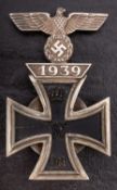 A WWI Iron Cross First Class pin with WWII 1939 Clasp to the top