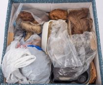 Estate of a doll restorer: a collection of dolls wigs,