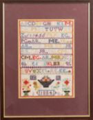 A 19th century woolwork alphabet sampler, initials I R 1884, framed and glazed, 30 x 20.