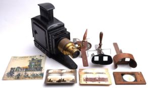 An early 20th century tinplate and brass Magic Lantern,