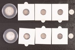 An 1849 Godless Florin with 1879, 1877, 1875, and 1878 silver three pence.