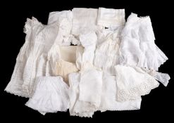 A collection of fourteen items of linen and lace white wear, women's under garments,