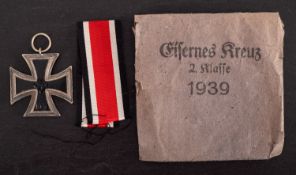 A WWII Iron Cross, Second Class with ribbon in envelope of issue.