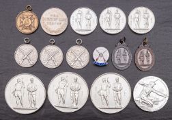 A group of fourteen National Rifle Association and other silver and silver plated medals,