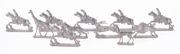 A group of German war time cast lead soldiers five mounted cavalry and five wild animals- mid 20th