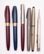 A Schafer silver fountain pen with hatched body, together with a silver propelling pencil,