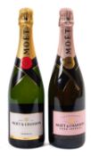 Two bottles of vintage champagne together with two bottles of Moet & Chandon