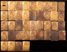 A collection of Edward VII The Life Guards Regiment cap badge or button stamps.