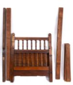 An Edwardian walnut single bed, early 20