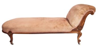 A Victorian carved walnut scroll end da