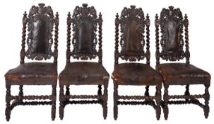 A set of four Victorian carved oak and l
