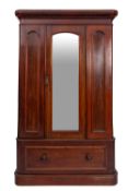 A Victorian mahogany wardrobe with a mou