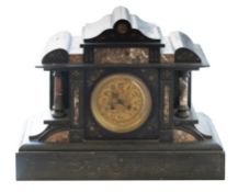 A Victorian black marble serpentine stri