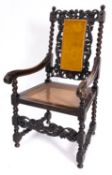 A carved beechwood open armchair in the