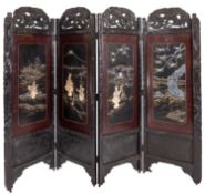 A Japanese carved ebonised wood and shib