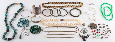 A mixed group of jewellery, including various hard stone and bead necklaces,