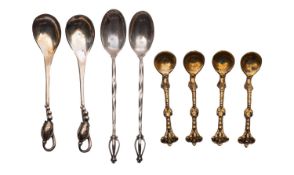 A pair of Georg Jensen silver Blossom pattern salt spoons, stamped 84 Sterling Denmark,