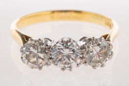A diamond trilogy ring, claw set with three brilliant-cut diamonds, diamonds approx. 1.