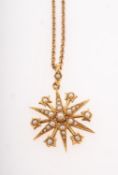 An antique star pendant with chain, the pendant of star form set with seed pearls,