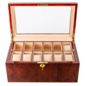 A wooden wristwatch display cabinet to hold twenty-four watches.