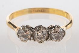 A three stone diamond ring, set with three old-cut diamonds, diamonds approx. 0.