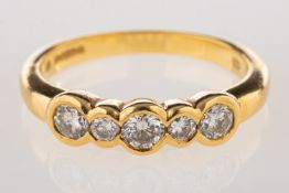 An 18ct five stone diamond ring, set with five brilliant-cut diamonds, diamonds approx. 0.