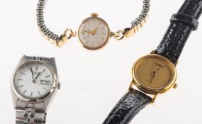 Waltham a lady's 9ct gold wristwatch the round silvered dial having raised baton numerals,