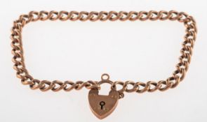 A curb link bracelet, with heart padlock, marked 9ct, length approx. 21.0cm, 7.9grams.