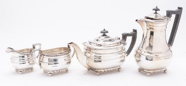 A George VI silver four piece tea service by Walker and Hall, Sheffield 1951,