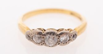 An 18ct gold five stone diamond ring, set with five graduated brilliant-cut diamonds,