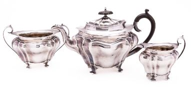 An Edward VII Chester silver three piece tea service by Walker and Hall, Chester 1906,