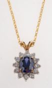 A 9ct gold cluster pendant and chain,