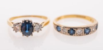A group of two 18ct gold sapphire and diamond rings,