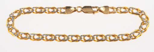 A 9ct gold bi-colour bracelet, of curb links with a textured finish, UK import mark, length approx.