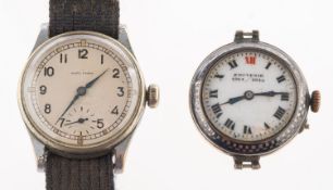 Marc Favre a stainless-steel 1940s military watch with canvas strap, the case rear numbered 149215,