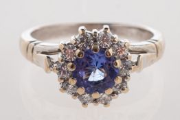 A tanzanite and diamond ring,