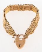 A gate bracelet, with heart padlock and safety chain, marked 9ct, length approx. 20.0cm, 26.