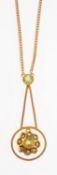 An antique peridot and pearl pendant with chain,