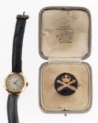 A 9ct gold 1930s wristwatch the movement stamped Swiss Made,