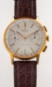 WITHDRAWN Breitling a steel and gold gentleman's chronograph wristwatch the silvered dial with two