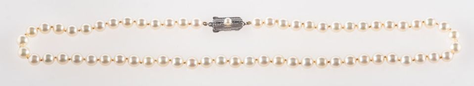 Mikimoto. A pearl necklace, a string of white cultured pearls, approx. 6.