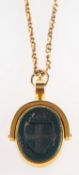 A fob seal and chain, the seal set with carnelian and a carved bloodstone,