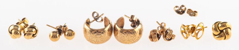 A mixed group of earrings, including an openwork pair of studs, marked 750, 0.