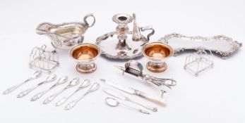 A mixed group of Sheffield plate and silver plate; including a chamberstick, candle snuffer tray,