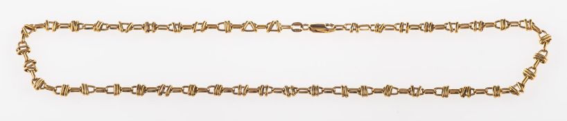 A fancy-link chain, an oval open link chain, every other link with two overlapped sliding links,
